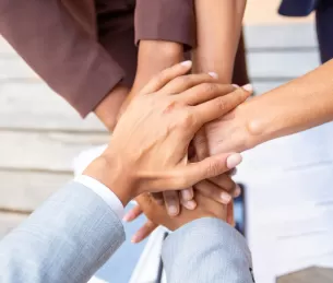 successful-business-team-expressing-unity